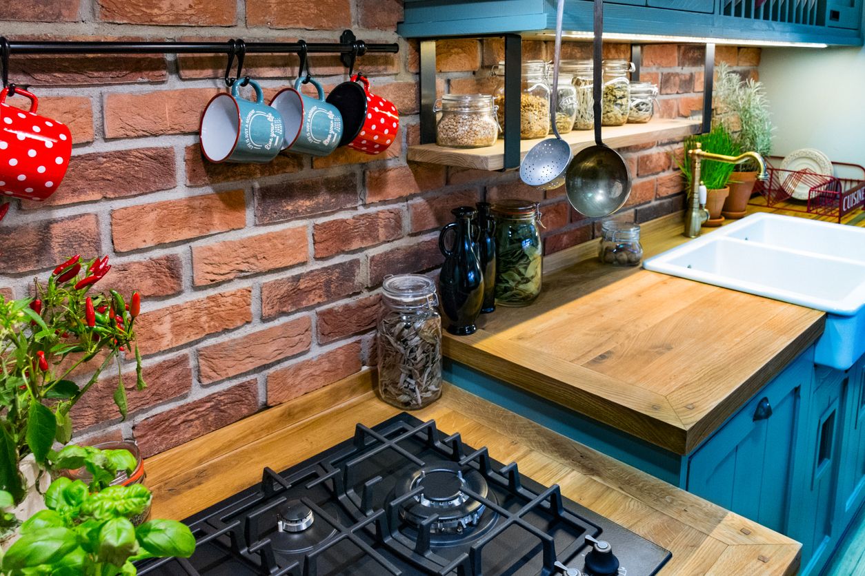 Dark wood countertop- Blue Kitchen Cabinets - An Extraordinary Trending Design!