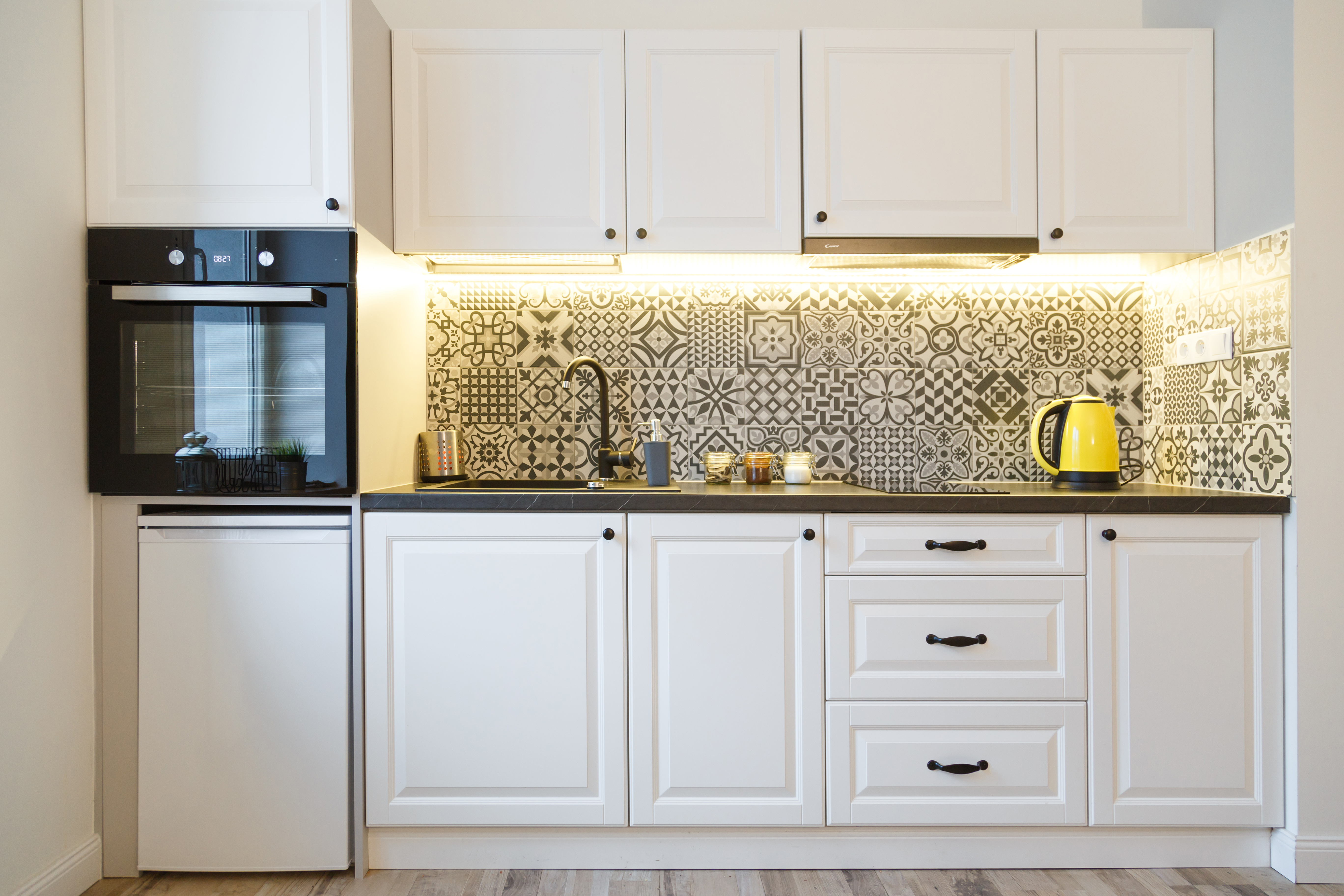 4. Install under cabinet lighting to brighten up your countertops.